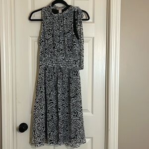 Banana Republic dress. Versatile. Sheer floral over full lining. Tie detail. 4
